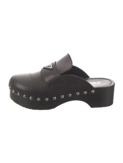 Pre-owned Prada Enameled Metal Triangle Leather Mules In Black