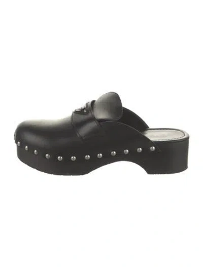 Pre-owned Prada Enameled Metal Triangle Leather Mules In Black