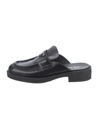 Pre-owned Prada Enameled Metal Triangle Leather Mules In Black