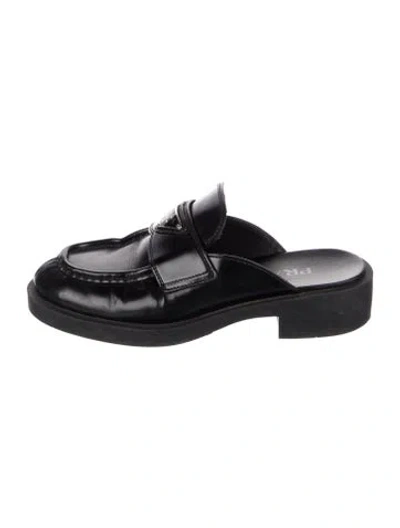 Pre-owned Prada Enameled Metal Triangle Leather Mules In Black
