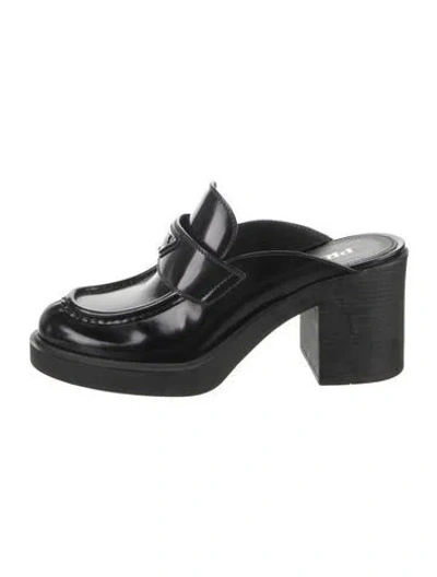 Pre-owned Prada Enameled Metal Triangle Leather Mules In Black