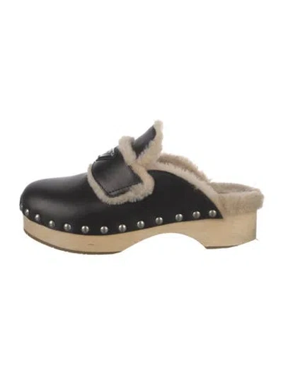 Pre-owned Prada Enameled Metal Triangle Leather Mules In Black