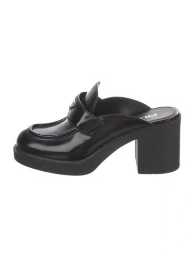 Pre-owned Prada Enameled Metal Triangle Leather Mules In Black