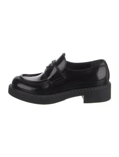 Pre-owned Prada Enameled Metal Triangle Leather Oxfords In Black