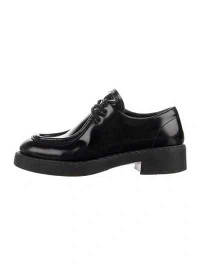Pre-owned Prada Enameled Metal Triangle Leather Oxfords In Black