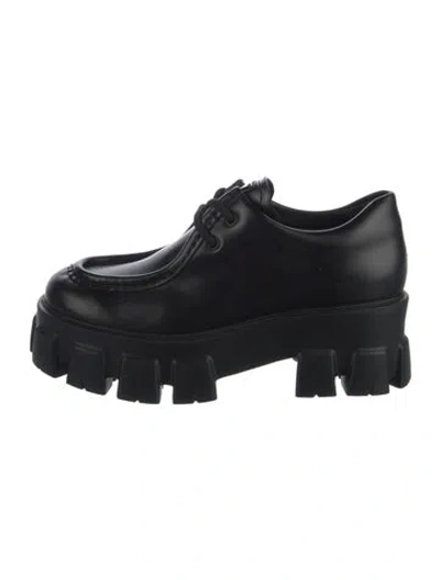 Pre-owned Prada Enameled Metal Triangle Leather Oxfords In Black