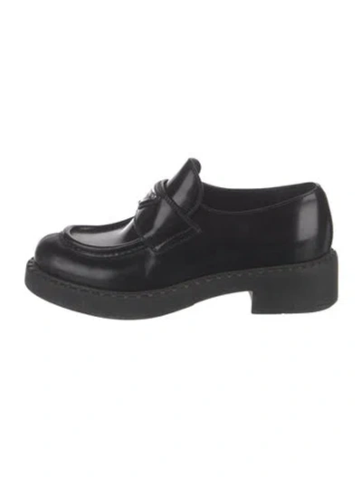 Pre-owned Prada Enameled Metal Triangle Leather Pumps In Black