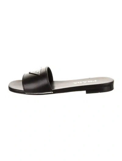 Pre-owned Prada Enameled Metal Triangle Leather Slides In Black