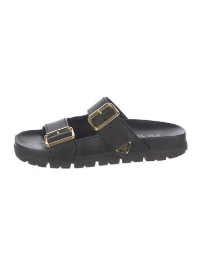 Pre-owned Prada Enameled Metal Triangle Leather Slides In Black