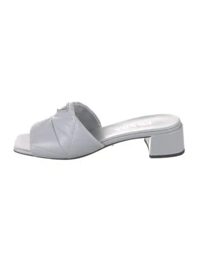 Pre-owned Prada Enameled Metal Triangle Leather Slides In Blue