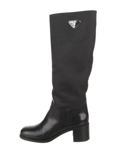 Pre-owned Prada Enameled Metal Triangle Nylon Riding Boots In Black