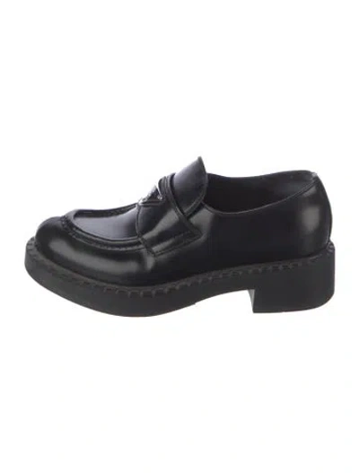 Pre-owned Prada Enameled Metal Triangle Patent Leather Loafers In Black