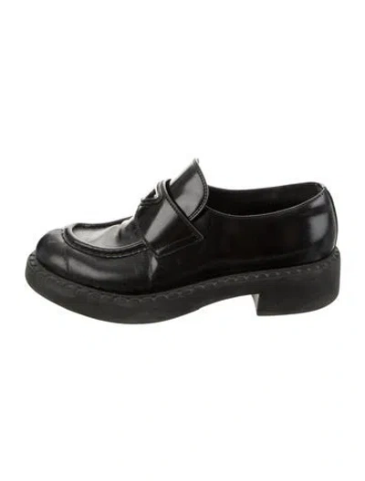Pre-owned Prada Enameled Metal Triangle Patent Leather Loafers In Black