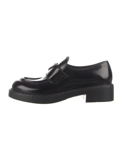 Pre-owned Prada Enameled Metal Triangle Patent Leather Loafers In Black