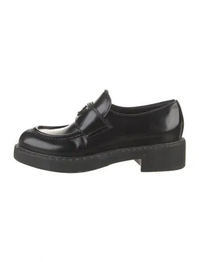 Pre-owned Prada Enameled Metal Triangle Patent Leather Loafers In Black