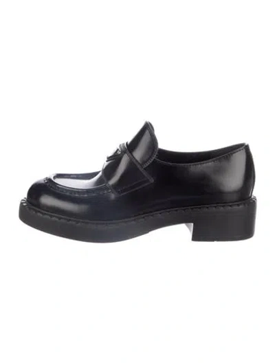 Pre-owned Prada Enameled Metal Triangle Patent Leather Loafers In Black
