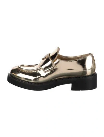 Pre-owned Prada Enameled Metal Triangle Patent Leather Loafers In Gold/metallic