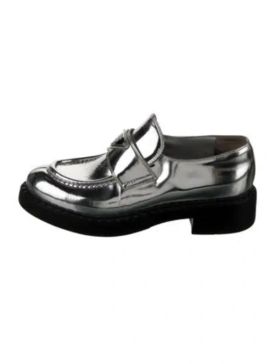 Pre-owned Prada Enameled Metal Triangle Patent Leather Loafers In Metallic/silver