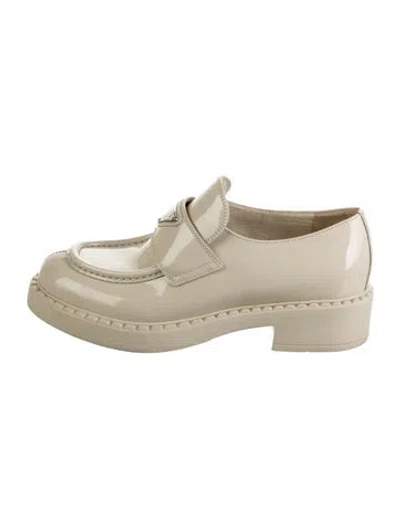 Pre-owned Prada Enameled Metal Triangle Patent Leather Loafers In Neutrals