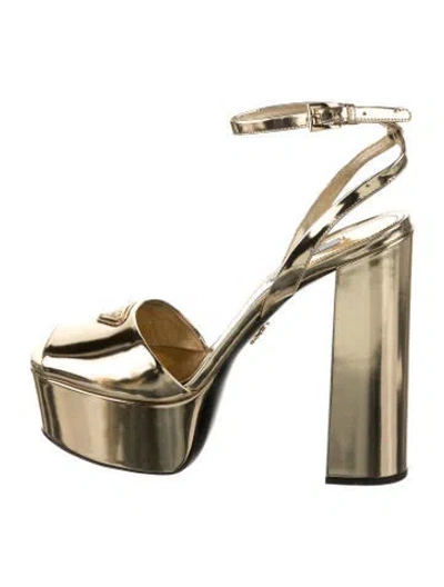 Pre-owned Prada Enameled Metal Triangle Patent Leather Pumps In Gold/metallic