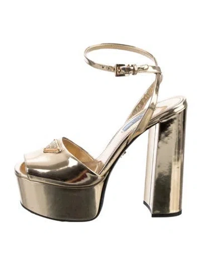 Pre-owned Prada Enameled Metal Triangle Patent Leather Pumps In Gold/metallic