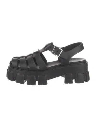 Pre-owned Prada Enameled Metal Triangle Rubber Gladiator Sandals In Black