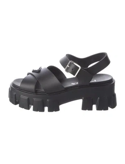Pre-owned Prada Enameled Metal Triangle Rubber Slingback Sandals In Black