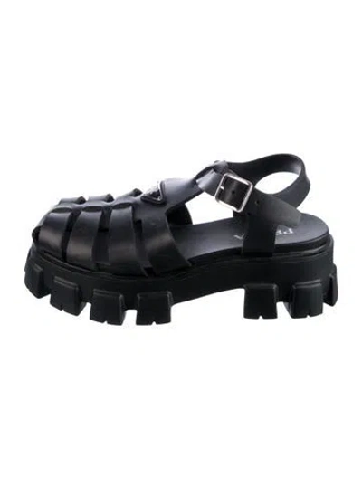 Pre-owned Prada Enameled Metal Triangle Rubber Slingback Sandals In Black