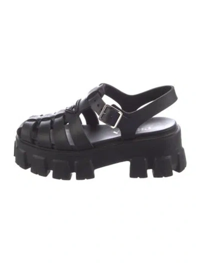 Pre-owned Prada Enameled Metal Triangle Rubber Slingback Sandals In Black