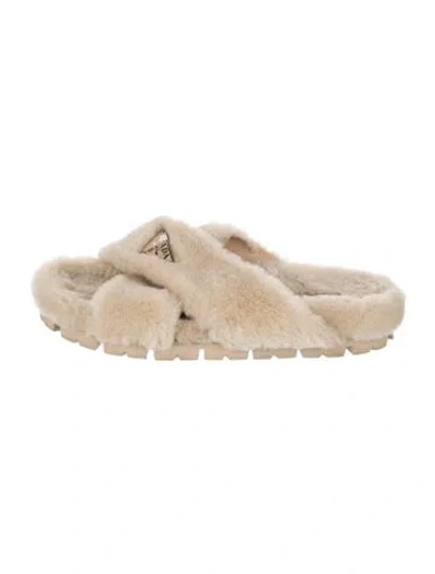 Pre-owned Prada Enameled Metal Triangle Shearling Slides In Neutral