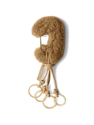 Prada Engraved Logo Rings Keychain Charm In Brown