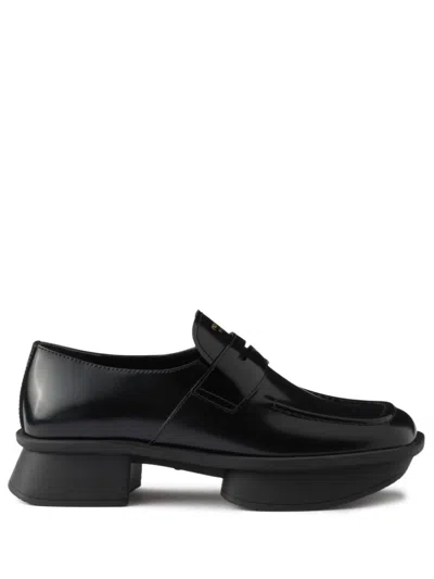 Prada Re-edition Equal Platform Penny Loafer In Nero