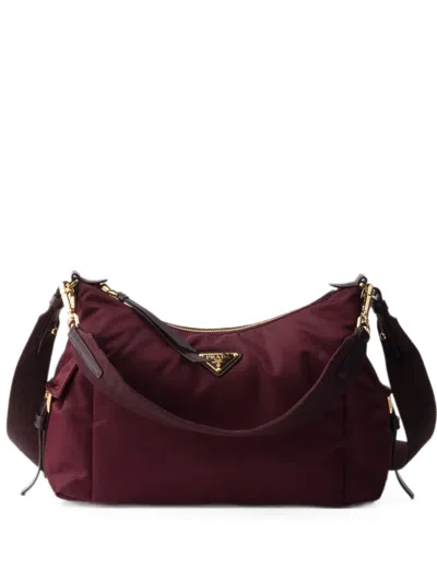 Prada Explore Large Re-nylon And Leather Bag In Burgundy