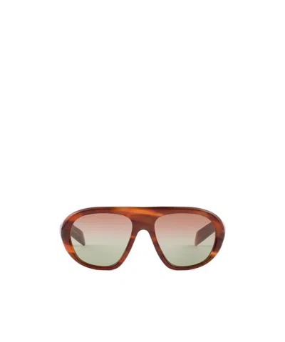 Prada Eyewear Collection Sunglasses In Brown