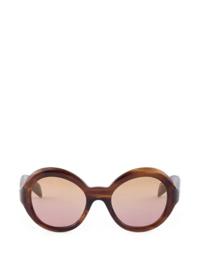 Prada Eyewear Collection Sunglasses In Transparent