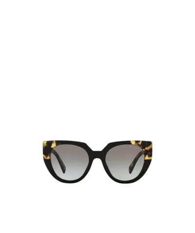 PRADA PRADA EYEWEAR ROUND FRAME SUNGLASSES