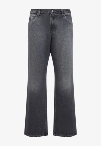 Prada Flared Faded Denim Pants In Black