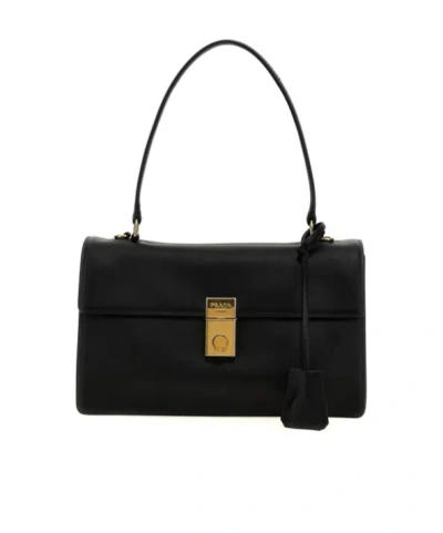 Prada Flip Shoulder Bag In Black