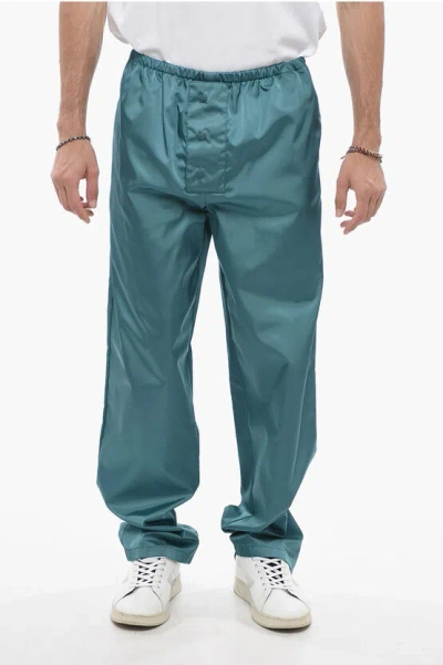 Prada Front Buttoned Re-nylon Pants In Blue