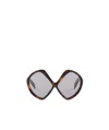 Prada Tortoiseshell Sunglasses In Gray