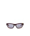 Prada Symbole Sunglasses In Ochre