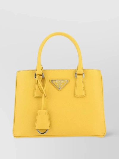 Prada Compact Textured Leather Handbag In Yellow