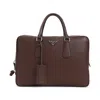 Prada Grained Leather Tote Bag In Brown
