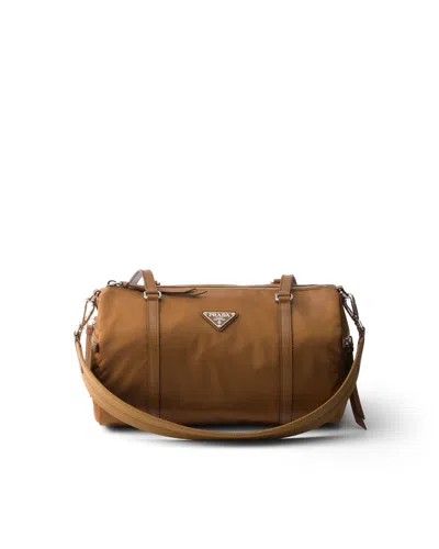 Prada Large Re-nylon And Saffiano Leather Duffel Bag In Brown
