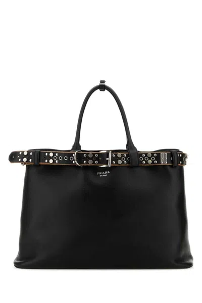 Prada Buckle Leather Bag With Studded Belt In Black