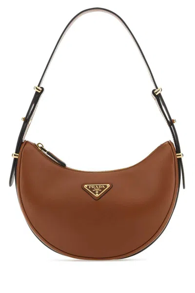 Prada Triangle Logo Plaque Moon Shaped Shoulder Bag In Cognacn