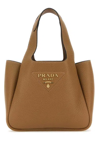 Prada Handbags. In Beige O Tan