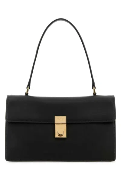 Prada Handbags. In Black