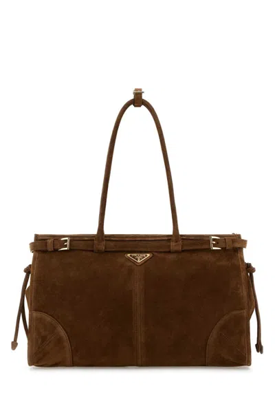 Prada Handbags. In Brown