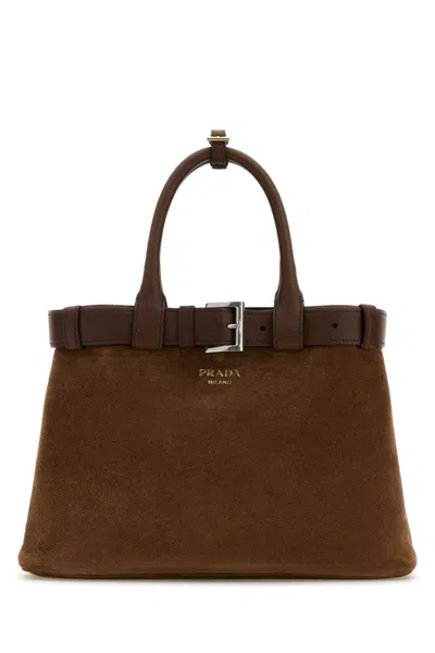 Prada Handbags. In Brown